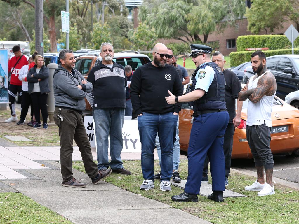 Protestors have begun to gather outside Kiis FM headquarters in North Ryde to protest against comments Kyle Sandilands made about Christians and the Virgin Mary. Picture: David Swift.