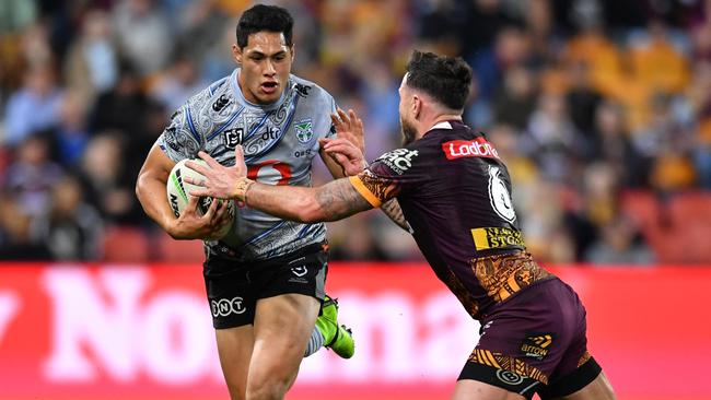 Roger Tuivasa-Sheck (left) now owns the NRL run metres record for a single game. Picture: AAP