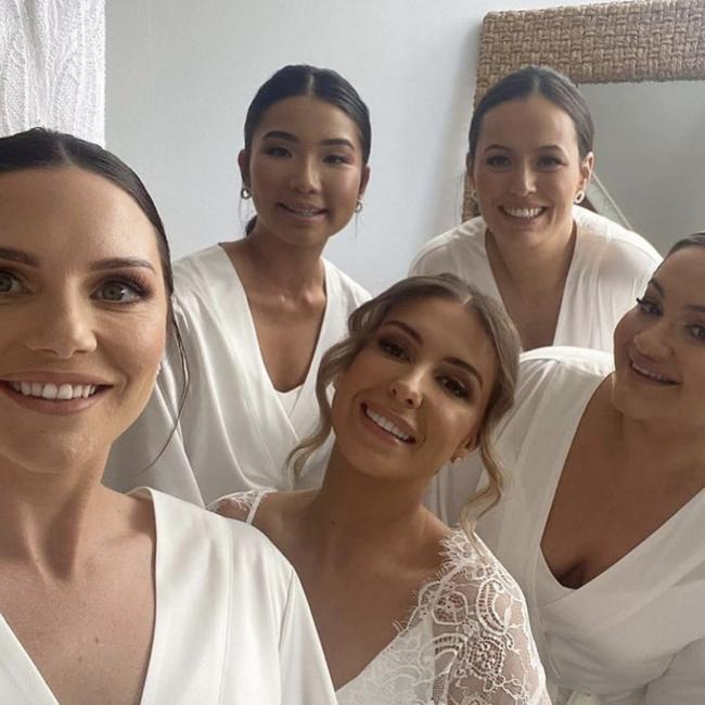 A bride and bridal party all bronzed up by Kimmy at Spray Tans Coorparoo. Picture: Supplied