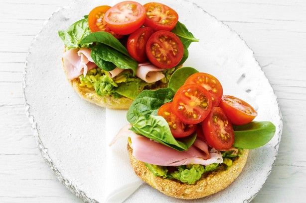 Spicy avocado toasted muffin with shaved ham and spinach