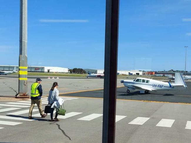 Krystle Miller and pilot Owen Crees leaving Adelaide for Cobar, NSW.