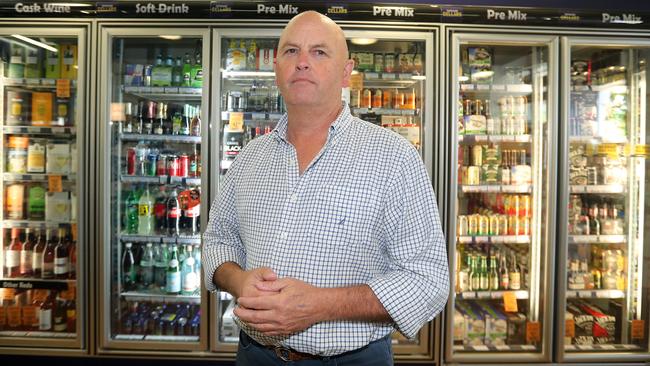 Greg Swift at Cellarbrations Coolangatta. Tweed and Gold Coast brewers have to post two different price lists for beers and ciders, depending which side of the border their products are sold until Queensland introduces a similar recycling deposit scheme. Photo by Richard Gosling