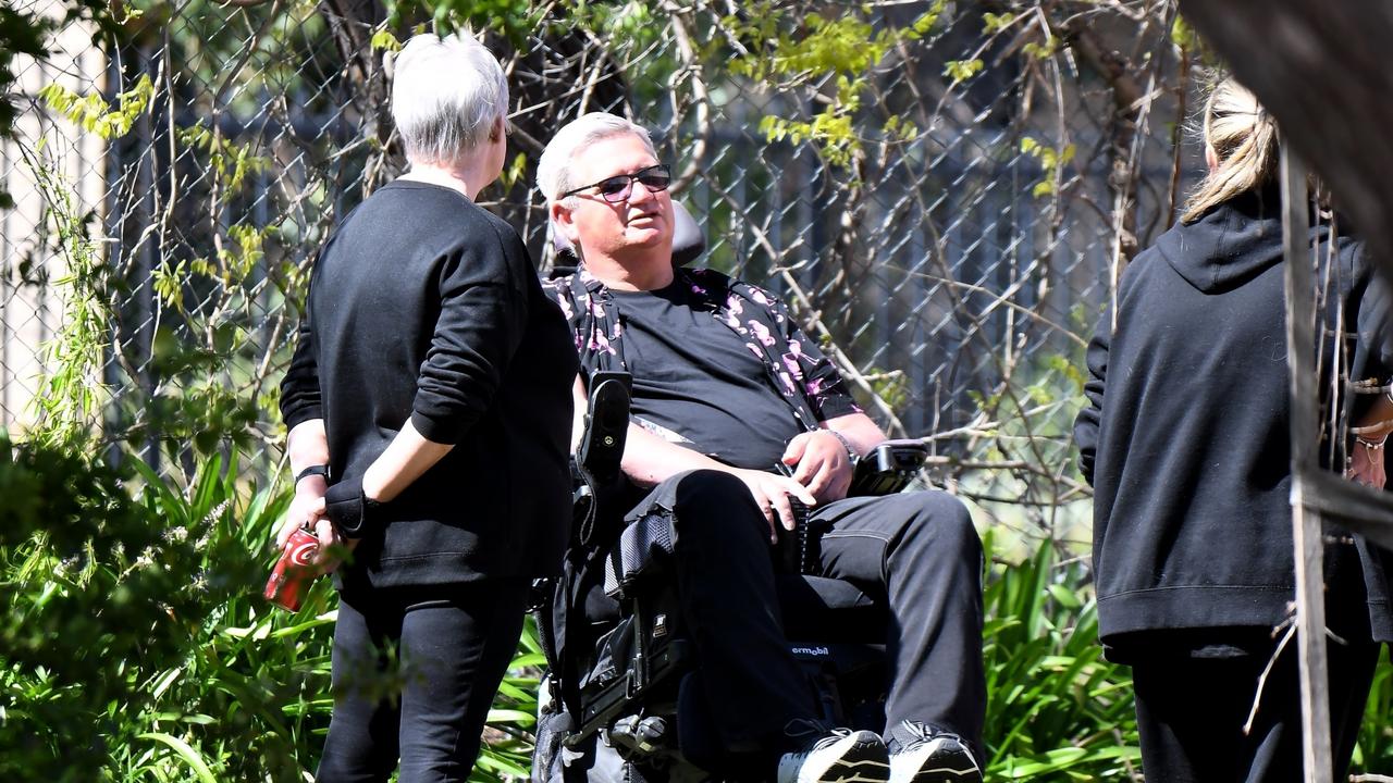 Lily’s father John is seen reflecting nearby before the service. Backgrid via NCA NewsWire.