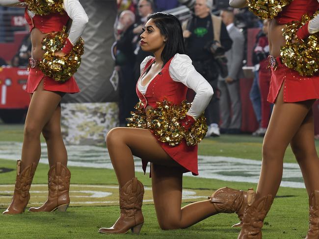 SANTA CLARA, CA - NOVEMBER 12: A San Francisco 49ers Gold Rush cheerleader kneels during the national anthem prior to the NFL game between the San Francisco 49ers and the New York Giants at Levi's Stadium on November 12, 2018 in Santa Clara, California. (Photo by Thearon W. Henderson/Getty Images)