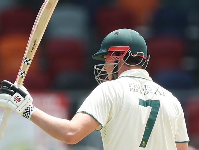 CANBERRA, AUSTRALIA - DECEMBER 08:  Matthew Renshaw of the Prime Ministers XI celebrates and acknowledges the crowd after scoring a half century during day three of the Tour Match between PM's XI and Pakistan at Manuka Oval on December 08, 2023 in Canberra, Australia. (Photo by Mark Metcalfe/Getty Images)