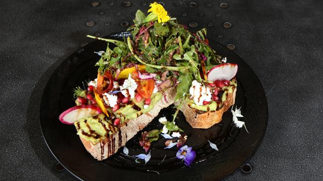 Kaffeine & Co’s smashed avo — with all the extras. Picture: Robert Pozo
