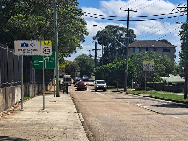 Victoria Road is a "high clutter area" where signs can be hidden to approaching motorists by shrubs and stopped buses. Picture: Supplied