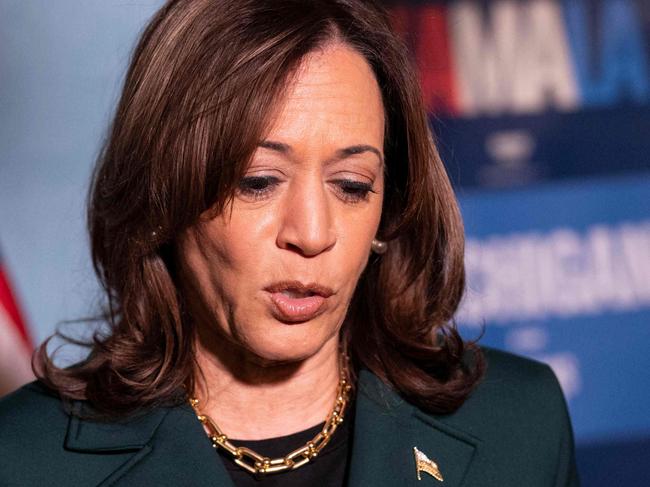 ROYAL OAK, MICHIGAN - OCTOBER 21: Democratic presidential nominee, Vice President Kamala Harris, answers questions from the press before a town hall with former U.S. Rep. Liz Cheney (R-WY) at the Royal Oak Music Theatre on October 21, 2024 in Royal Oak, Michigan. Cheney joined Vice President Harris for stops Monday in Pennsylvania, Michigan and Wisconsin.   Sarah Rice/Getty Images/AFP (Photo by Sarah Rice / GETTY IMAGES NORTH AMERICA / Getty Images via AFP)