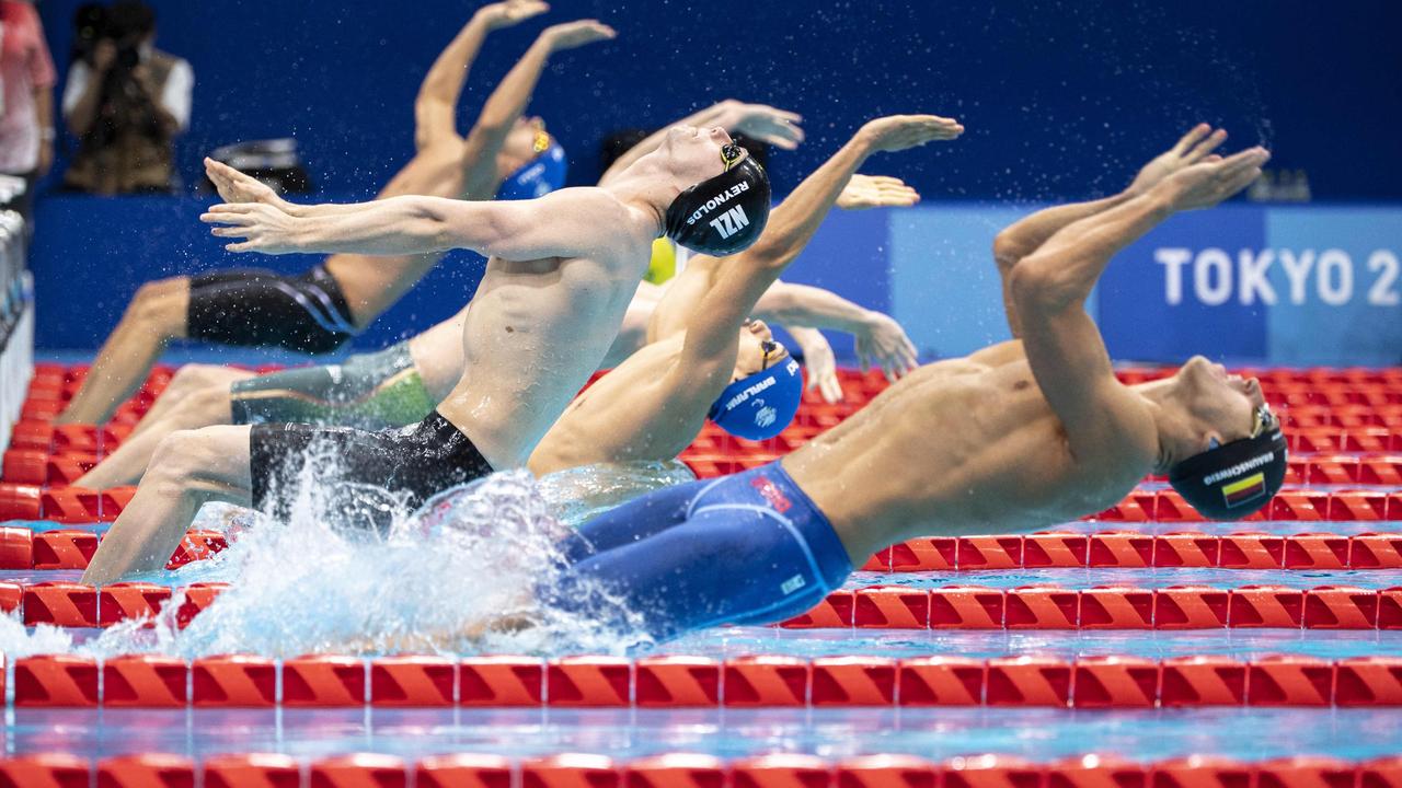 Athletes compete in the men's 100m backstroke S9 swimming heat at the Tokyo 2020