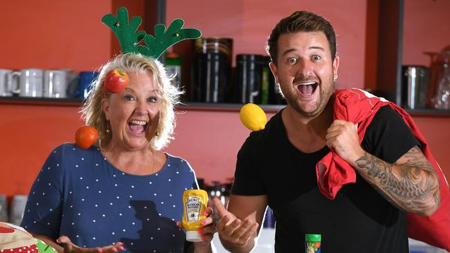 Susie Longman and Cam Christie volunteer from the Labrador free Christmas lunch. Picture, John Gass