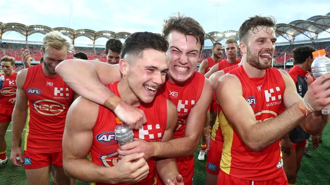 Gold Coast celebrates its last-gasp win over Carlton. Picture: Chris Hyde/Getty Images. 