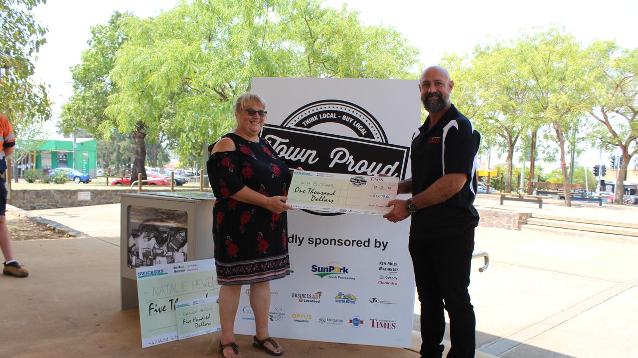 Award winner Kim Butcher and South Burnett Times General Manager Daniel Pelcl at the cheque presentation for Town Proud 2019.