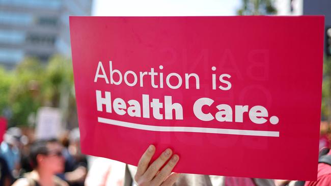 Protestors demonstrate at the March for Reproductive Rights organized by Women’s March in Los Angeles.