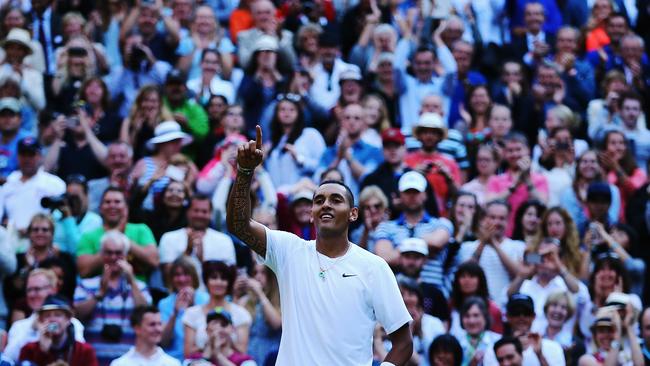 Nick Kyrgios celebrates his breakthrough Wimbledon triumph over Rafael Nadal in 2014.