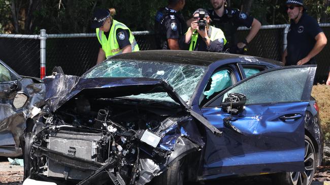 Police at the scene of a fatal crash at the intersection of Castle Hill Drive and Dohles Rocks road at Murrumba Downs on Thursday. Picture Lachie Millard