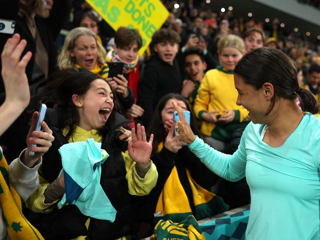 Matilda’s superstar Sam Kerr gives her shirt to an excited fan after Australia’s win v Canada in the critical World Cup game in Melbourne. Picture: Alex Pantling/Getty Images