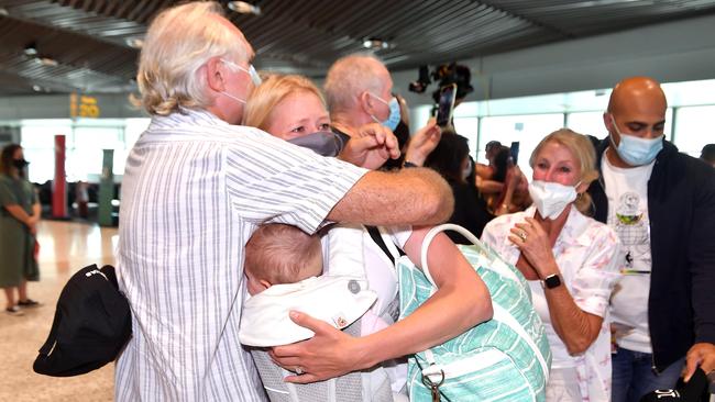 Reunions at Brisbane Airport on Monday morning. Picture: NCA NewsWire / John Gass