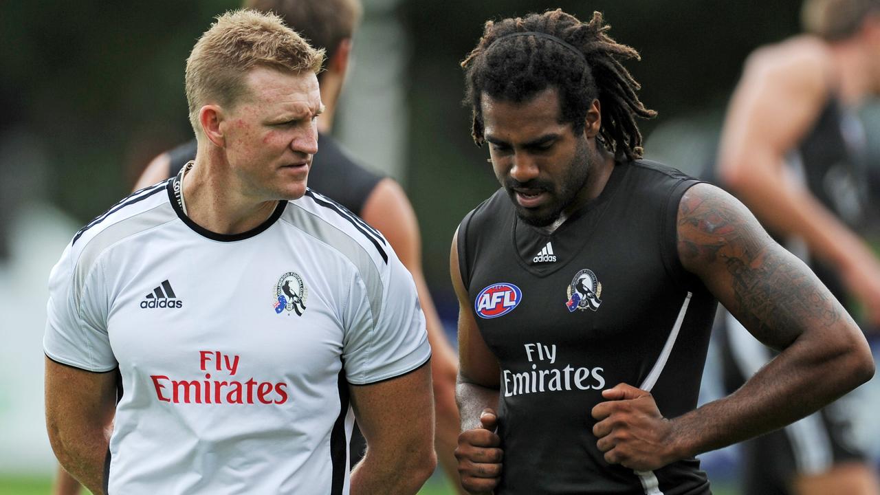 Heritier Lumumba, seen here with Magpies coach Nathan Buckley, has criticised the club for his “experiences of racism (that) were inadequately dealt with”.