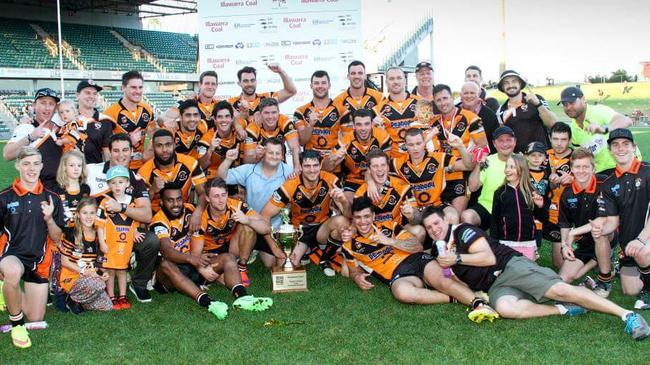 Boyle and the Helensburgh Tiger celebrate grand final victory in 2015. Picture: Dorian Cobb