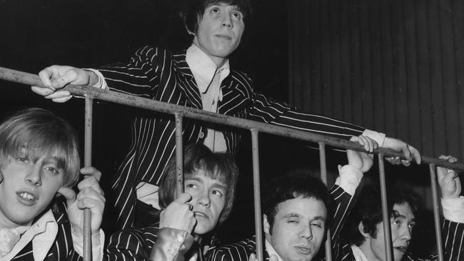 APRIL 13, 1975 : Singer Stevie Wright (top) and Easybeats band members (L-R) George Young, Harry Vanda, Snowy Fleet & Dick Diamonde arrive at Sydney Airport 13/04/75. Easybeats/band Historical