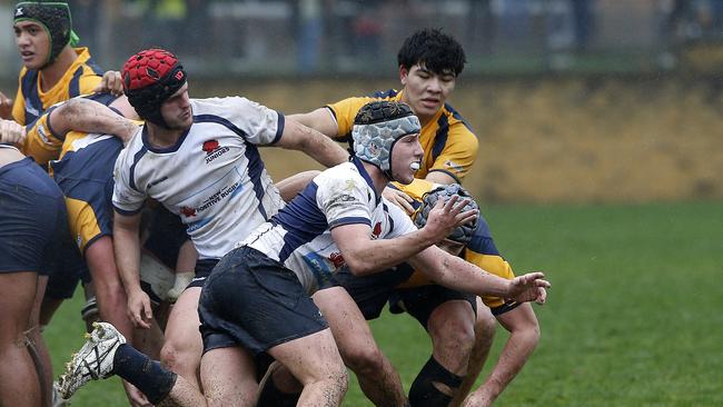 NSW's Joe Hutton gets the ball away against ACT.