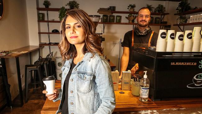 Shaini Hosseini, the owner of the Uplift coffee shop in Perth’s CBD, with staff member Alejandro Gonzalez. Picture: Colin Murty