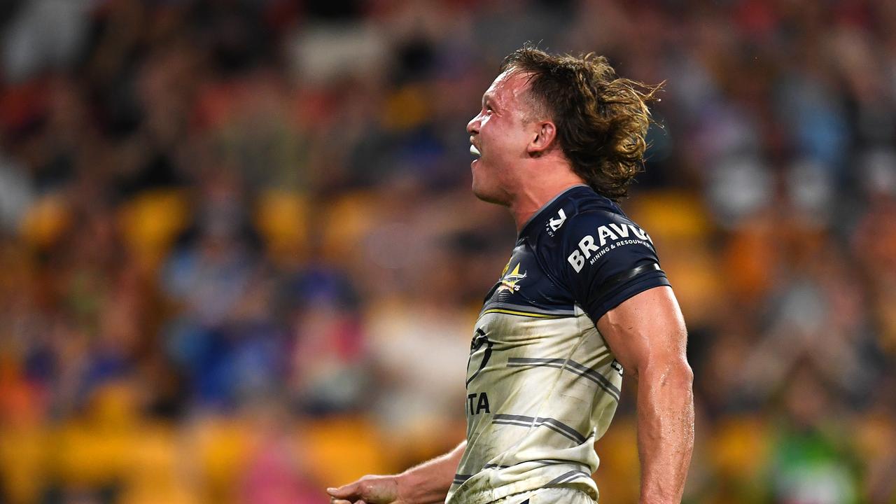 Former Sarina Crocs junior Reuben Cotter celebrates scoring a try for the Cowboys. (Photo by Albert Perez/Getty Images)