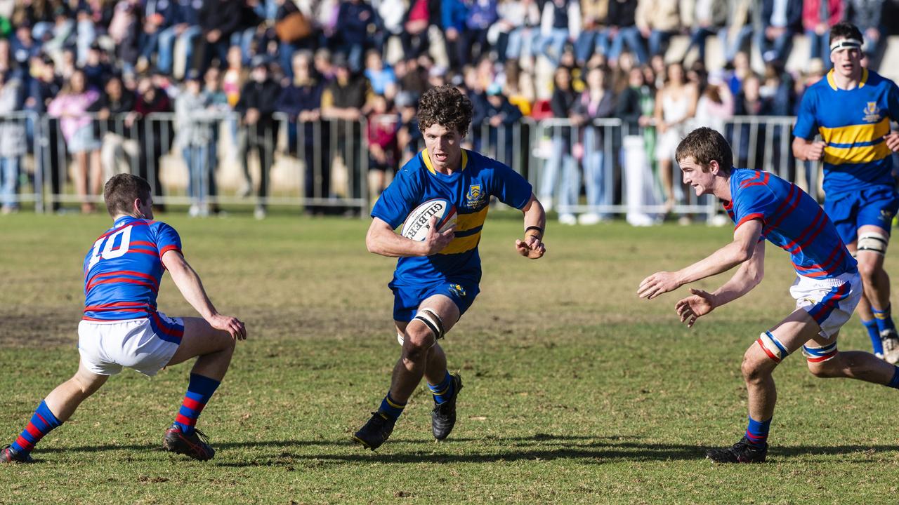 Xander Jacobs (centre) for Grammar against Downlands in O'Callaghan Cup on Grammar Downlands Day at Downlands College, Saturday, August 6, 2022. Picture: Kevin Farmer