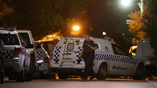 Police at the scene of the alleged murder in 2018. Picture: David Crosling