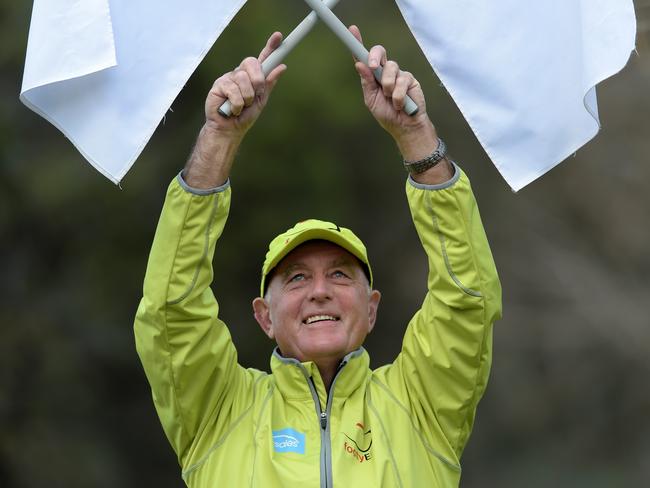 Martien Pruysers of Ferntree Gully has been field and goal umpiring for 40 years and just brought up his 1800th game. Martien prepares for his next game at Bayswater oval.