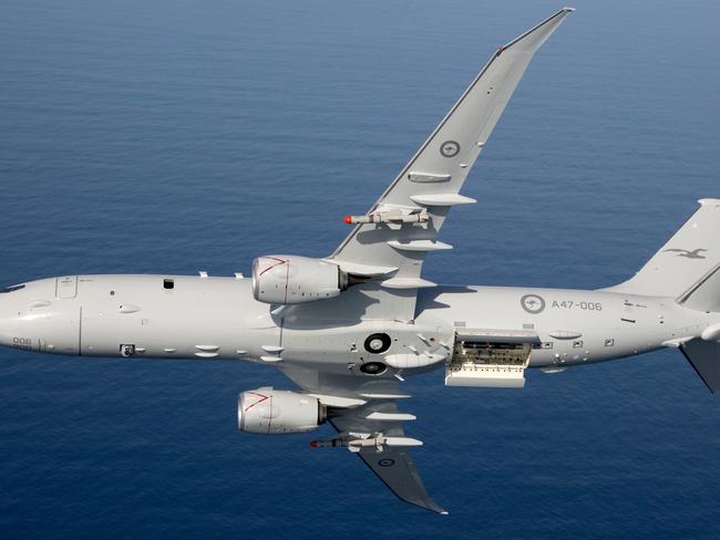 Air to Air photo of Royal Australian Air Force P-8A Poseidon with Harpoon Missiles. *** Local Caption *** Air to Air photo of Royal Australian Air Force P-8A Poseidon with Harpoon Missiles.