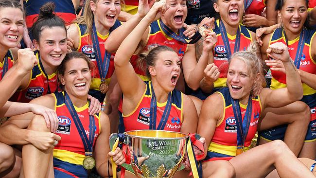 Adelaide Crows players celebrate their grand final win against Carlton. Picture: Tom Huntley