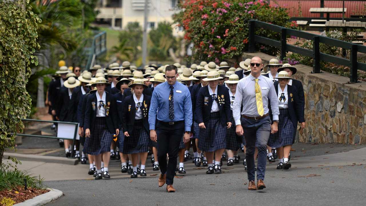 Rockhampton Girls Grammar School students march up to a service celebrating the lives of Bev and Olivia Harwood. Picture: Michelle Gately