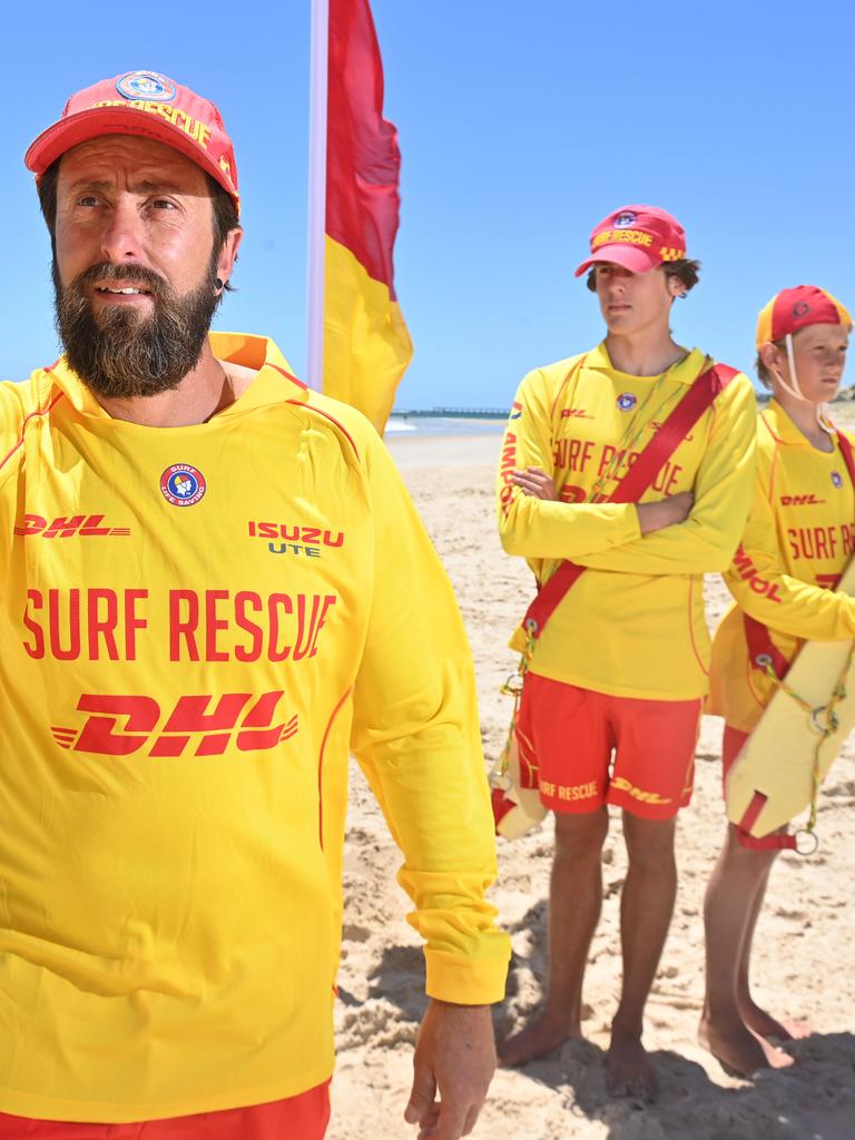 Aaron now patrols South Port beach with his two sons Frankie, 13, and Leo, 17, who are also surf lifesavers. Picture: Keryn Stevens