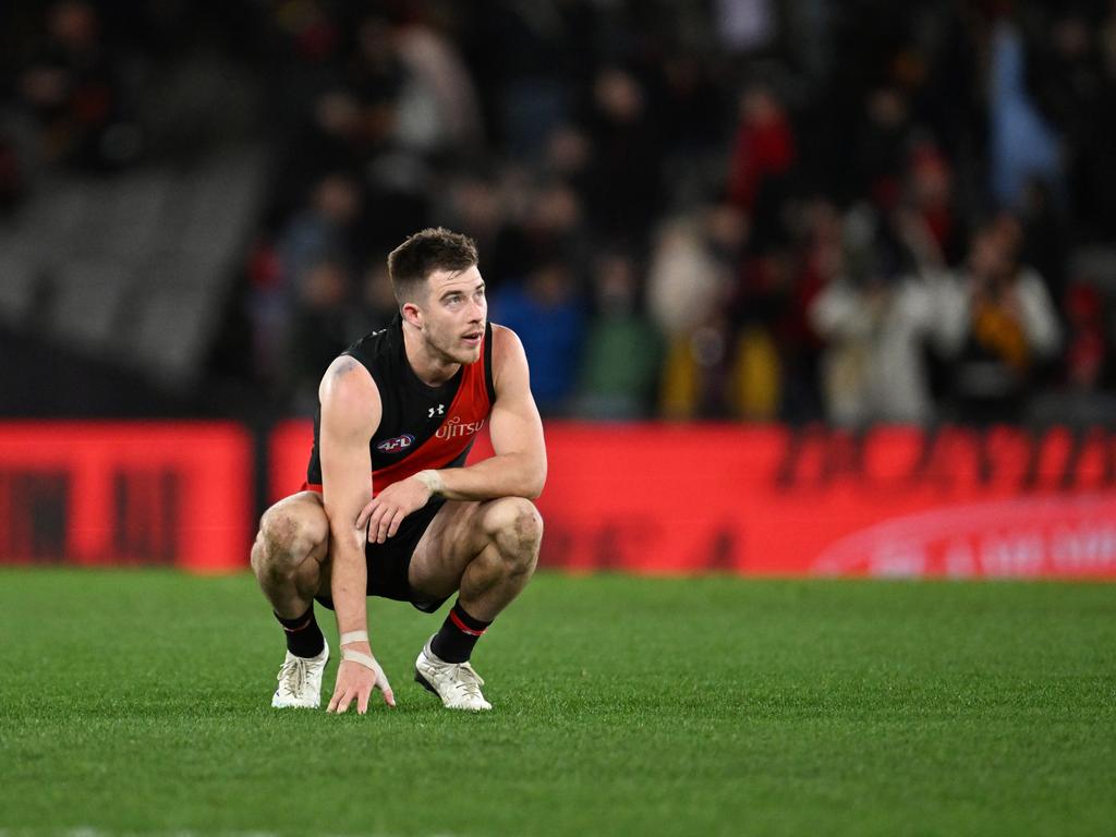 MELBOURNE, AUSTRALIA – JULY 19: Zach Merrett of the Bombers reacts on the final siren during the round 19 AFL match between Essendon Bombers and Adelaide Crows at Marvel Stadium, on July 19, 2024, in Melbourne, Australia. (Photo by Daniel Pockett/Getty Images)