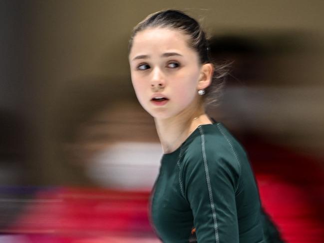 Russia's Kamila Valieva attends a training session on February 14, 2022 prior the figure skating event at the Beijing 2022 Winter Olympic Games. - Russian teenage figure skating sensation Kamila Valieva was on February 14 cleared by the Court of Arbitration for Sport to continue competing in the Beijing Olympics despite failing a doping test. CAS said it had rejected appeals by the International Olympic Committee, the World Anti-Doping Agency and the International Skating Union to have the suspension of the 15-year-old reinstated. The prodigious Valieva, who has not been cleared of doping, is now able to take part in the singles event that begins on Tuesday and will be favourite to win. (Photo by Anne-Christine POUJOULAT / AFP)