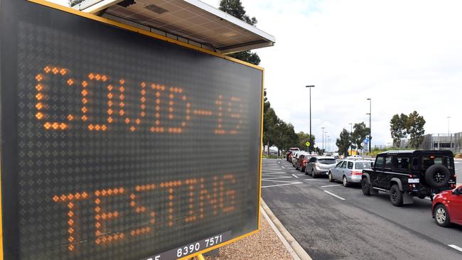 A long queue of cars wait at a drive-through COVID-19 testing site in a Melbourne shopping centre carpark. Picture: AFP.