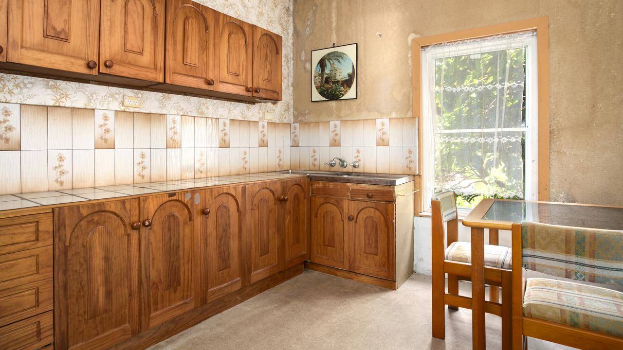 The downstairs kitchen looks to have been built in the 1970s.