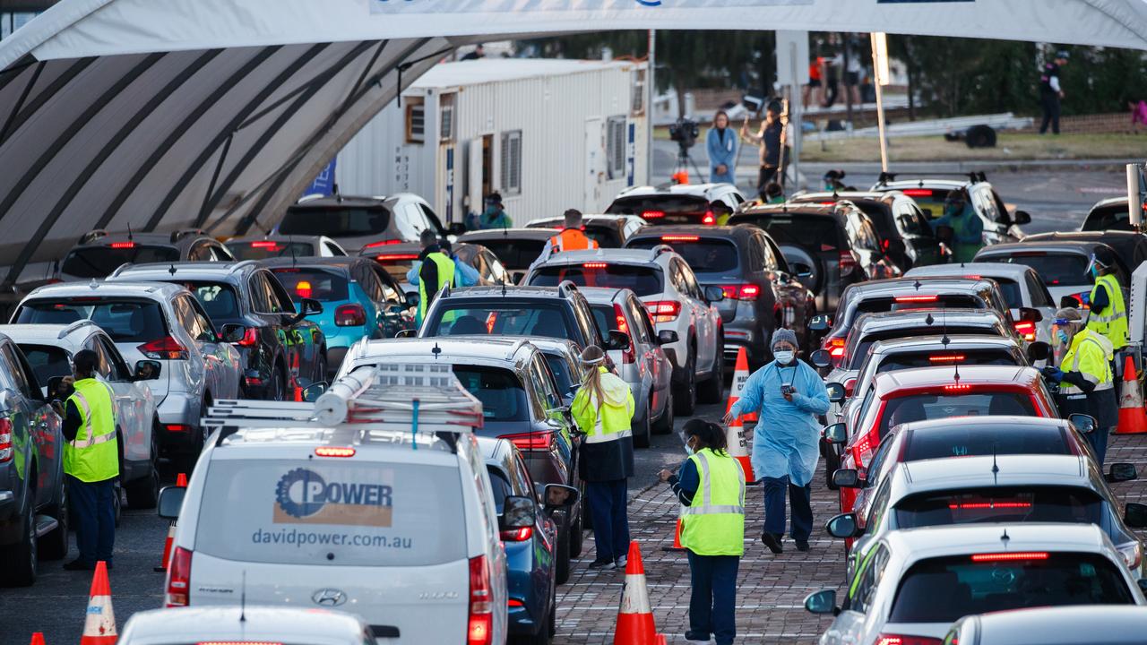 Cars queue at the Bondi Beach drive-through covid testing clinic after two new local cases. Picture: Tim Pascoe