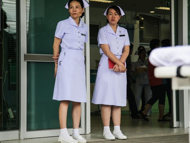 Nurses wait for the boys outside the Chaing Rai Prachanukroh Hospital. Picture: Lauren DeCicca/Getty Images