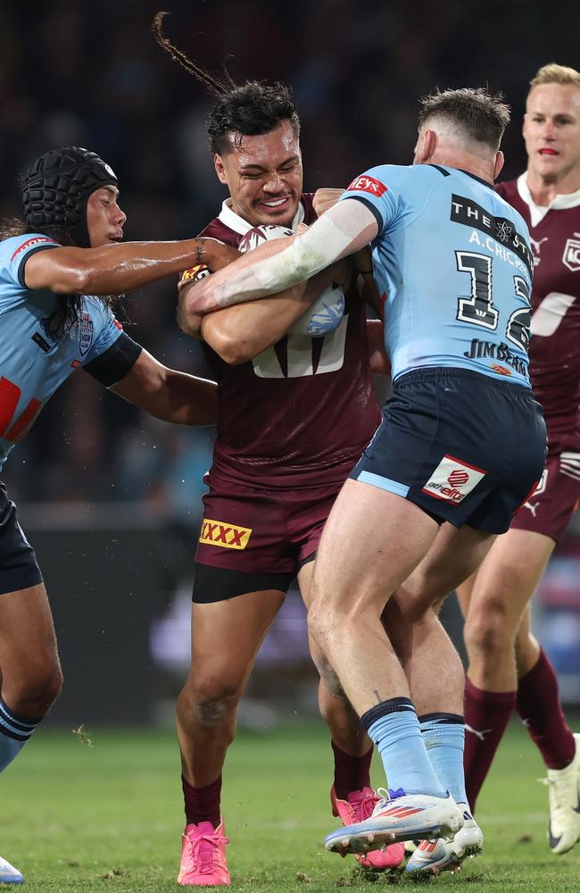 Jeremiah Nanai of the Maroons is tackled by Jarome Luai and Angus Crichton. (Photo by Matt King/Getty Images)