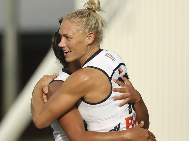 Adelaide's Erin Phillips celebrates her first goal during the Round 6 AFLW match between the Adelaide Crows and the Fremantle Dockers at TIO Stadium in Darwin, Friday, March 9, 2018. (AAP Image/Glenn Campbell) NO ARCHIVING, EDITORIAL USE ONLY