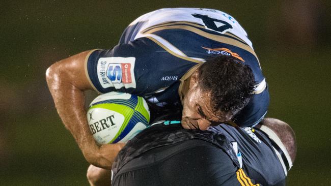Brumbies lock Rory Arnold is tackled by a Chiefs player on the Sunshine Coast. Photo: RUGBY.com.au/Stuart Walmsley
