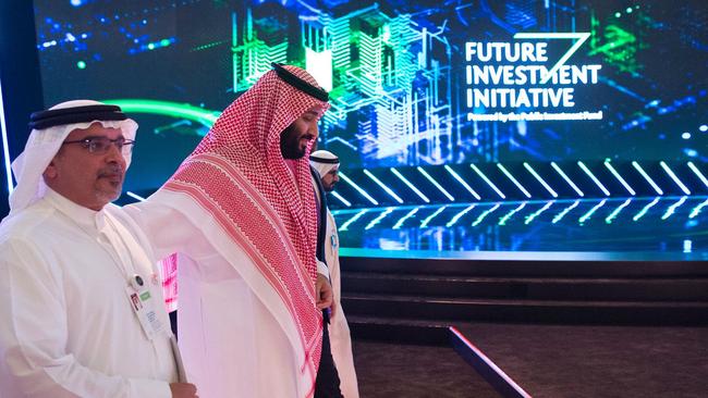 Saudi Crown Prince Mohammed bin Salman walking with his Bahraini counterpart Crown Prince Salman bin Hamad bin Isa Al-Khalifa, during the Future Investment Initiative  conference.