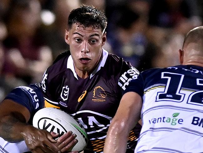 BRISBANE, AUSTRALIA - FEBRUARY 27: Jordan Riki of the Broncos takes on the defence during the NRL Trial Match between the Brisbane Broncos and the North Queensland Cowboys at Moreton Daily Stadium on February 27, 2021 in Brisbane, Australia. (Photo by Bradley Kanaris/Getty Images)