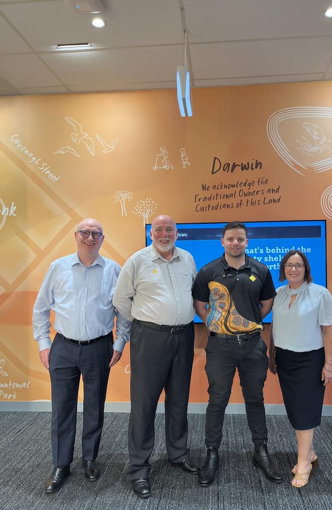 Kerry McGowan, and Marlon Saunders with Darwin branch manager Daniel Pastore and regional general manager, customer service network NT