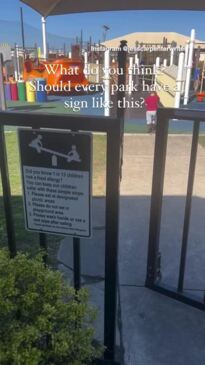 Allergy warning sign outside playground divides internet