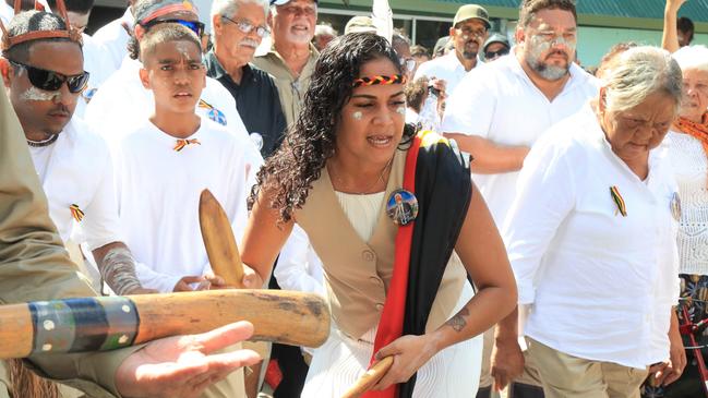 Mourner's dance outside the St Alban's Anglican Church in Yarrabah following the funeral for Alfred Neal on June 20, 2023. Picture: Peter Carruthers