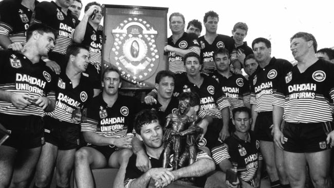 Royce Simmons cuddles the Winfield Cup after the Panthers’ premeriship win in 1991.