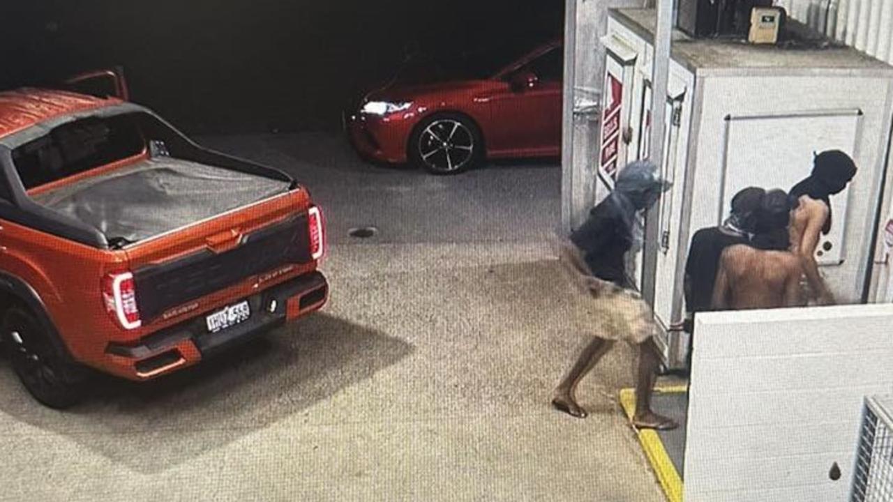 Five offenders in an orange Ford Ranger force entry to the Stratford Service Station on Friday night. Picture: Supplied